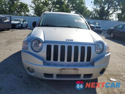 Piąte zdjęcie samochodu w środku: 2009 JEEP COMPASS SPORT VIN:1J4FT47A19D139593 - miniatura
