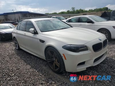 Czwarte zdjęcie samochodu z boku: 2013 BMW M5 VIN:WBSFV9C52DC774089 - miniatura