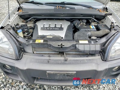 Zdjęcie 12 z 13 samochodu: 2007 HYUNDAI TUCSON SE VIN:KM8JN12D77U524689 - miniatura