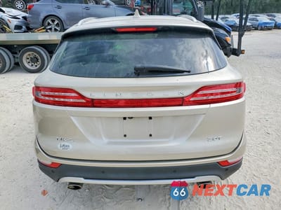 Zdjęcie 6 z 14 samochodu: 2017 LINCOLN MKC RESERVE VIN:5LMCJ3C92HUL55271 - miniatura