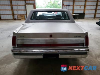 Zdjęcie 6 z 13 samochodu: 1989 LINCOLN TOWN CAR EXECUTIVE L VIN:1LNBM83F7KY627418 - miniatura