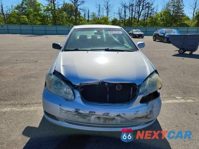 Piąte zdjęcie samochodu w środku: 2005 TOYOTA COROLLA LE VIN:2T1BR30E75C464704 - miniatura