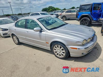 Czwarte zdjęcie samochodu z boku: 2002 JAGUAR X-TYPE 2.5 VIN:SAJEA51D72XC28562 - miniatura