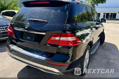 Czwarte zdjęcie samochodu z boku: 2015 MERCEDES-BENZ ML 350 VIN:4JGDA5JB7FA557255 - miniatura