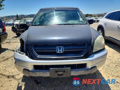 Piąte zdjęcie samochodu w środku: 2003 HONDA PILOT EXL VIN:2HKYF18723H591058 - miniatura