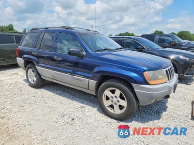 Czwarte zdjęcie samochodu z boku: 2000 JEEP GRAND CHEROKEE LAREDO VIN:1J4GW48S9YC235270 - miniatura