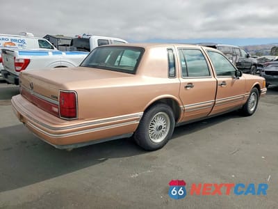 Trzecie zdjęcie samochodu z tyłu: 1994 LINCOLN TOWN CAR EXECUTIVE VIN:1LNLM81W5RY693239 - miniatura
