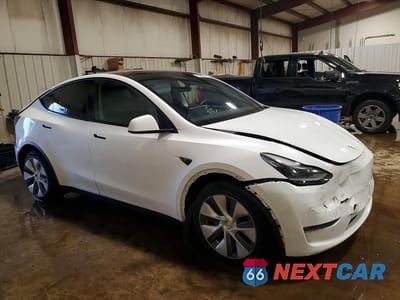 Czwarte zdjęcie samochodu z boku: 2023 TESLA MODEL Y VIN:7SAYGDEEXPA191383 - miniatura
