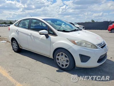 Czwarte zdjęcie samochodu z boku: 2013 FORD FIESTA SE VIN:3FADP4BJXDM107320 - miniatura