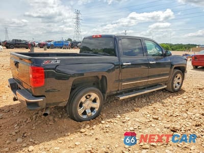 Trzecie zdjęcie samochodu z tyłu: 2014 CHEVROLET SILVERADO K1500 LTZ VIN:3GCUKSEJ8EG322199 - miniatura