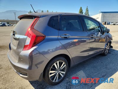 Trzecie zdjęcie samochodu z tyłu: 2020 HONDA FIT EX VIN:3HGGK5H80LM712396 - miniatura