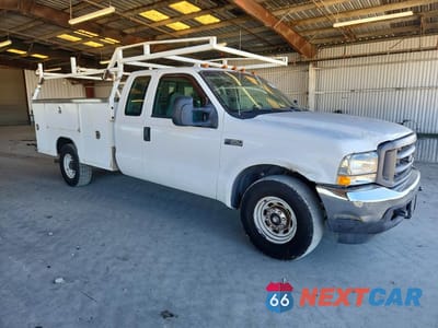Czwarte zdjęcie samochodu z boku: 2004 FORD F350 SRW SUPER DUTY VIN:1FDSX34L34EA18037 - miniatura