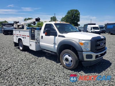 Czwarte zdjęcie samochodu z boku: 2016 FORD F550 SUPER DUTY VIN:1FDUF5GT3GED28129 - miniatura
