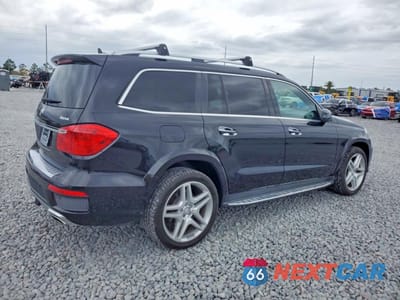 Trzecie zdjęcie samochodu z tyłu: 2015 MERCEDES-BENZ GL 550 4MATIC VIN:4JGDF7DE5FA456010 - miniatura