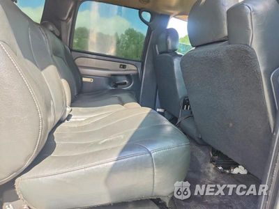 Zdjęcie 11 z 13 samochodu: 2001 CHEVROLET SUBURBAN C1500 VIN:1GNEC16T71J257521 - miniatura
