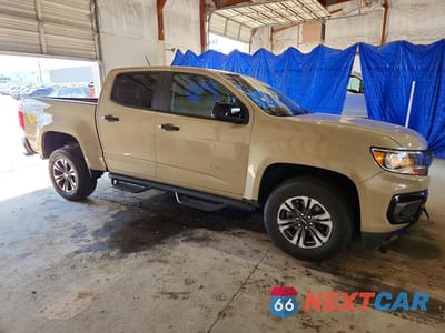 Czwarte zdjęcie samochodu z boku: 2021 CHEVROLET COLORADO Z71 VIN:1GCGTDEN3M1217401 - miniatura
