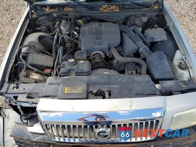 Zdjęcie 11 z 12 samochodu: 2006 MERCURY GRAND MARQUIS LS VIN:2MEFM75V16X606086 - miniatura