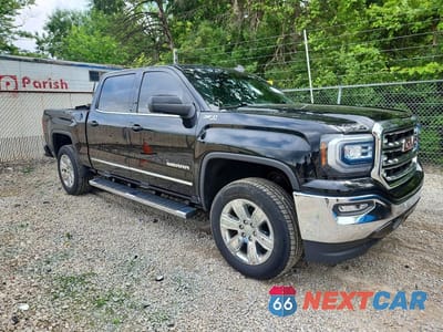 Czwarte zdjęcie samochodu z boku: 2018 GMC SIERRA K1500 SLT VIN:3GTU2NEC4JG439873 - miniatura