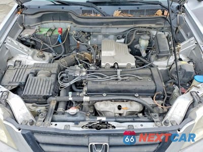 Zdjęcie 12 z 13 samochodu: 2001 HONDA CR-V LX VIN:JHLRD28401S003634 - miniatura