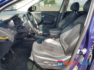 Zdjęcie 7 z 13 samochodu: 2013 HYUNDAI TUCSON LIMITED VIN:KM8JUCAC2DU581823 - miniatura