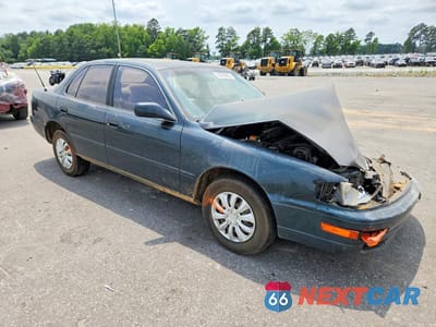 Czwarte zdjęcie samochodu z boku: 1994 TOYOTA CAMRY LE VIN:4T1SK12EXRU350447 - miniatura