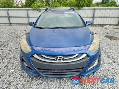Piąte zdjęcie samochodu w środku: 2014 HYUNDAI ELANTRA GT BASE VIN:KMHD35LH6EU225672 - miniatura