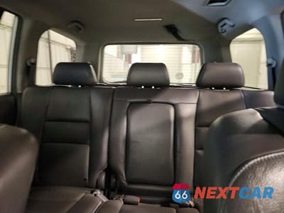 Zdjęcie 10 z 13 samochodu: 2007 HONDA PILOT EXL VIN:2HKYF18627H507401 - miniatura