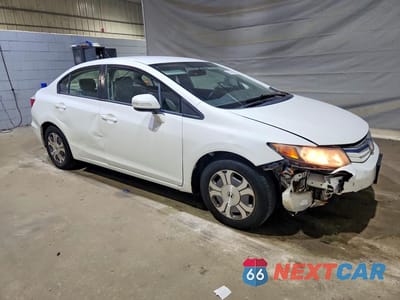 Czwarte zdjęcie samochodu z boku: 2012 HONDA CIVIC HYBRID VIN:JHMFB4F23CS011165 - miniatura