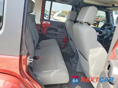 Zdjęcie 11 z 13 samochodu: 2009 JEEP WRANGLER UNLIMITED SAHARA VIN:1J4GA59179L767158 - miniatura