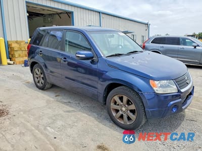 Czwarte zdjęcie samochodu z boku: 2012 SUZUKI GRAND VITARA SE VIN:JS3TE0D3XC4100219 - miniatura