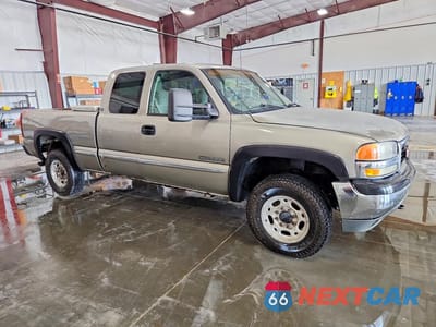 Czwarte zdjęcie samochodu z boku: 2000 GMC NEW SIERRA K2500 VIN:1GTGK29U8YE415320 - miniatura