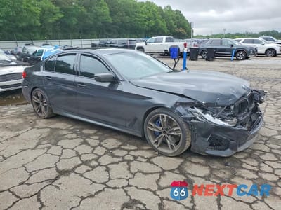 Czwarte zdjęcie samochodu z boku: 2018 BMW M550XI VIN:WBAJB9C5XJB049607 - miniatura
