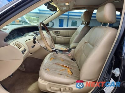 Zdjęcie 7 z 12 samochodu: 2003 TOYOTA AVALON XLS VIN:4T1BF28B03U330819 - miniatura