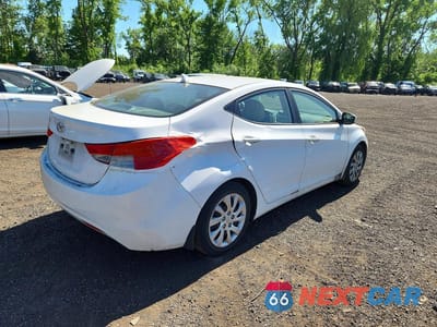 Trzecie zdjęcie samochodu z tyłu: 2012 HYUNDAI ELANTRA GLS VIN:5NPDH4AE6CH116158 - miniatura