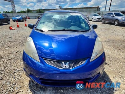 Piąte zdjęcie samochodu w środku: 2010 HONDA FIT VIN:JHMGE8G2XAS000095 - miniatura