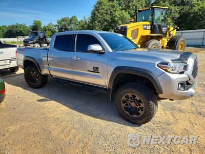 Czwarte zdjęcie samochodu z boku: 2019 TOYOTA TACOMA TRD OFF-ROAD VIN:3TMDZ5BN0KM077027 - miniatura