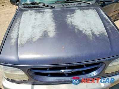 Zdjęcie 12 z 13 samochodu: 2000 FORD EXPLORER SPORT VIN:1FMYU60EXYUA98640 - miniatura