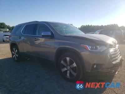 Czwarte zdjęcie samochodu z boku: 2018 CHEVROLET TRAVERSE LT VIN:1GNEVHKW7JJ159110 - miniatura