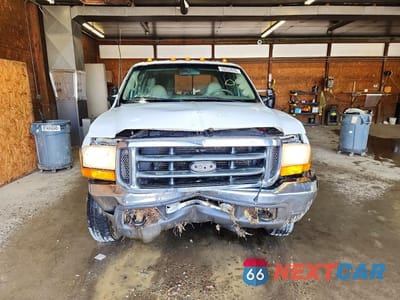 Piąte zdjęcie samochodu w środku: 2000 FORD F350 SUPER DUTY VIN:1FTWW33F6YEE04400 - miniatura