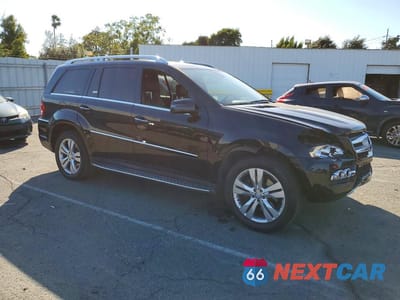 Czwarte zdjęcie samochodu z boku: 2011 MERCEDES-BENZ GL 450 4MATIC VIN:4JGBF7BEXBA679700 - miniatura
