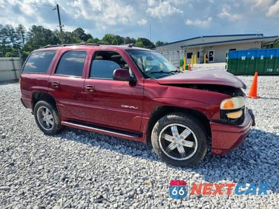 Czwarte zdjęcie samochodu z boku: 2003 GMC YUKON DENALI VIN:1GKEK63U13J246236 - miniatura