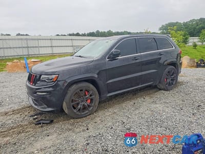 2014 JEEP GRAND CHEROKEE SRT-8 1C4RJFDJ0EC169581 - główne zdjęcie licytacji z USA - miniatura