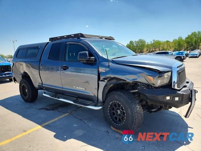 Czwarte zdjęcie samochodu z boku: 2010 TOYOTA TUNDRA DOUBLE CAB SR5 VIN:5TFUY5F11AX102360 - miniatura