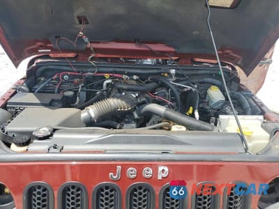 Zdjęcie 11 z 12 samochodu: 2007 JEEP WRANGLER SAHARA VIN:1J4GA59157L113188 - miniatura