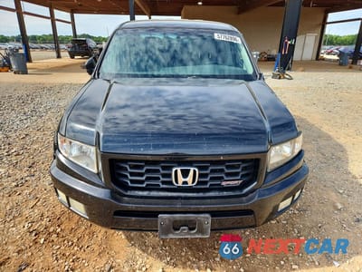 Piąte zdjęcie samochodu w środku: 2012 HONDA RIDGELINE SPORT VIN:5FPYK1F79CB002026 - miniatura