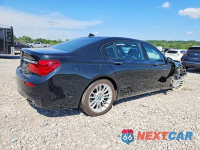 Trzecie zdjęcie samochodu z tyłu: 2015 BMW 750 LXI VIN:WBAYF8C50FD654793 - miniatura