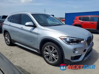 Czwarte zdjęcie samochodu z boku: 2016 BMW X1 XDRIVE28I VIN:WBXHT3Z30G4A50785 - miniatura
