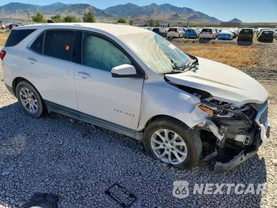 Czwarte zdjęcie samochodu z boku: 2018 CHEVROLET EQUINOX LT VIN:2GNAXJEV0J6352599 - miniatura
