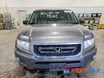 Piąte zdjęcie samochodu w środku: 2011 HONDA RIDGELINE RT VIN:5FPYK1F28BB003218 - miniatura