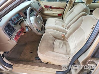 Zdjęcie 7 z 12 samochodu: 2001 MERCURY GRAND MARQUIS LS VIN:2MEFM75W01X679466 - miniatura